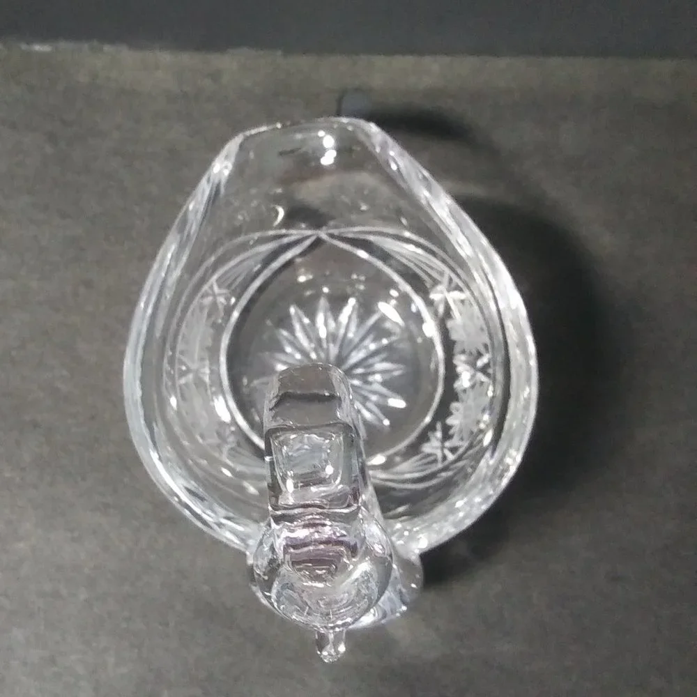 lovely clear glass swan shaped trinket dish with cut design on sides